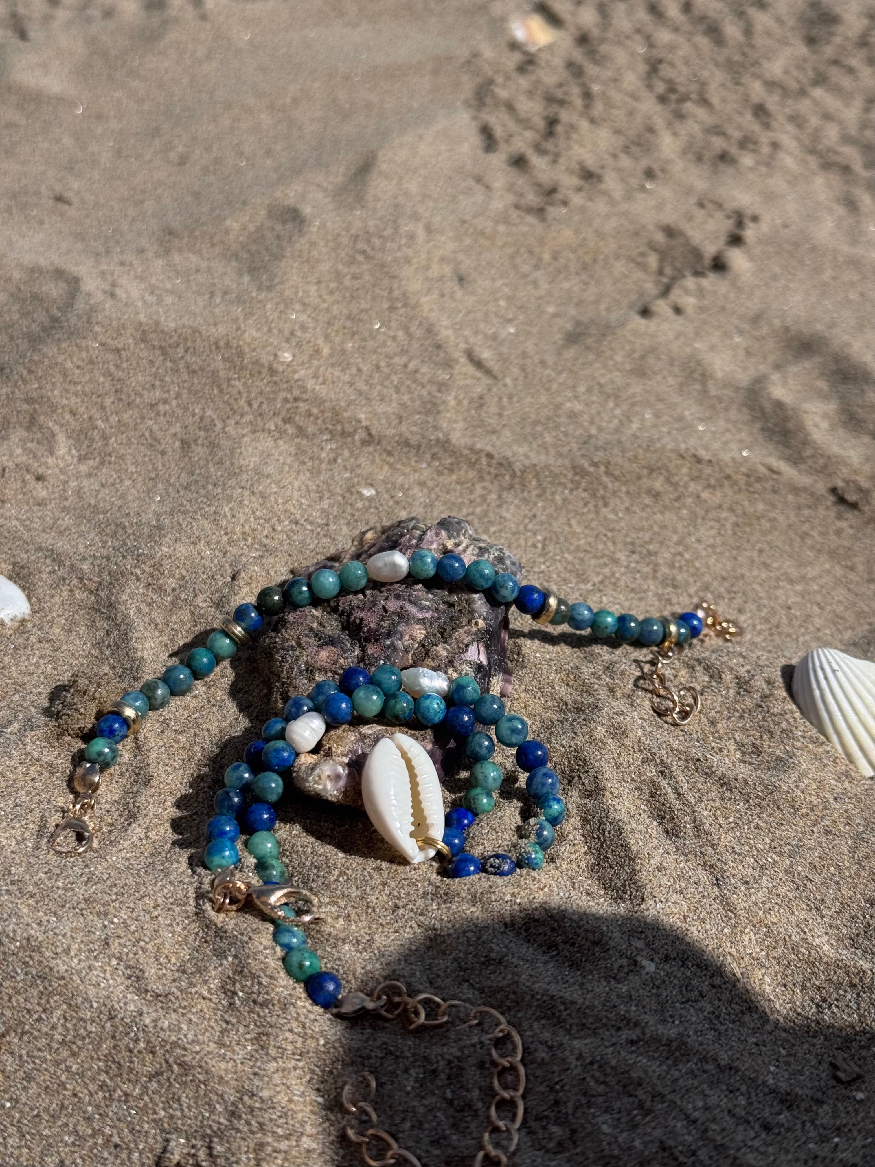 Armbänder und Fußketten